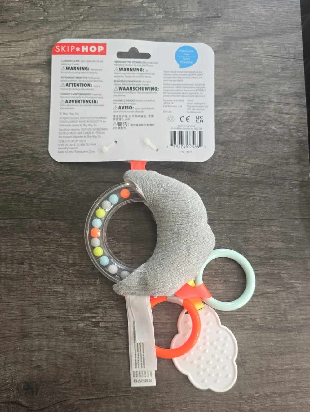 Skip Hop Silver Lining Cloud Rattle Moon Toy - Gray with Mint & Orange Rings